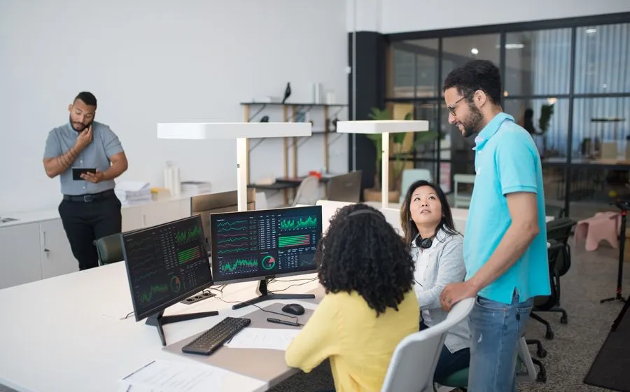 A team working at computer workstations