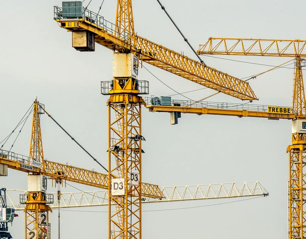 A construction site with cranes — Braintek IT for Houston construction companies