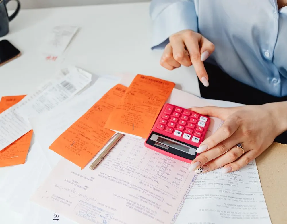 An accountant reviewing tax documents — Braintek IT for Houston CPA and financial firms