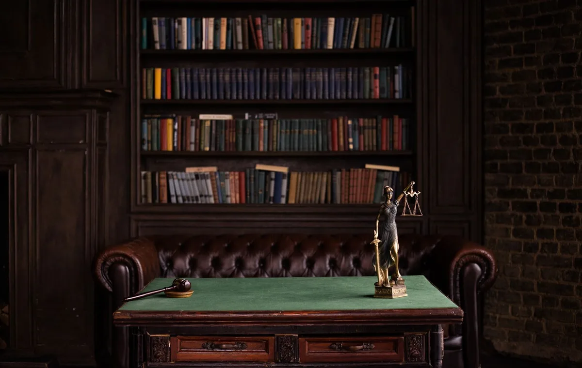 A law office with legal books and a laptop — Braintek IT support for Houston and DFW law firms