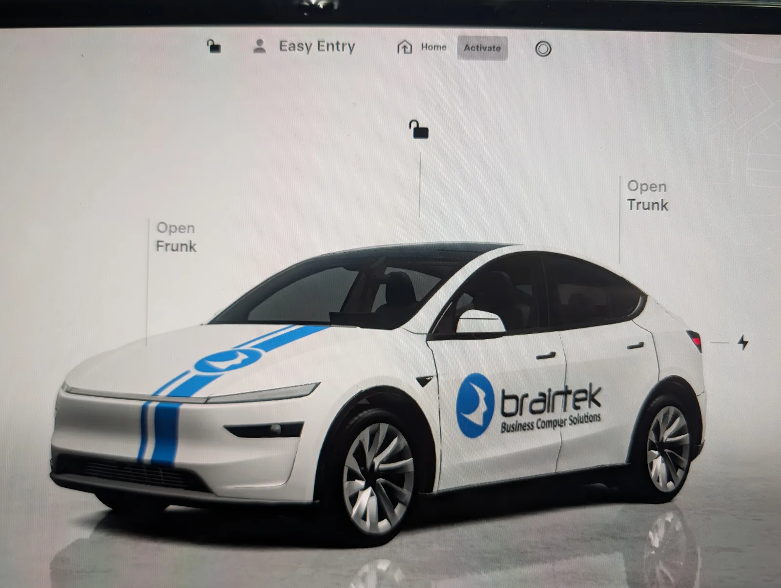 Braintek-branded custom wrap on the Tesla Model Y on-screen avatar