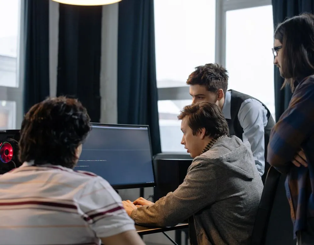 Braintek engineers working alongside a Houston business's in-house IT team