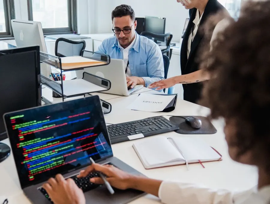 A Braintek engineer collaborating with a client's internal IT staff