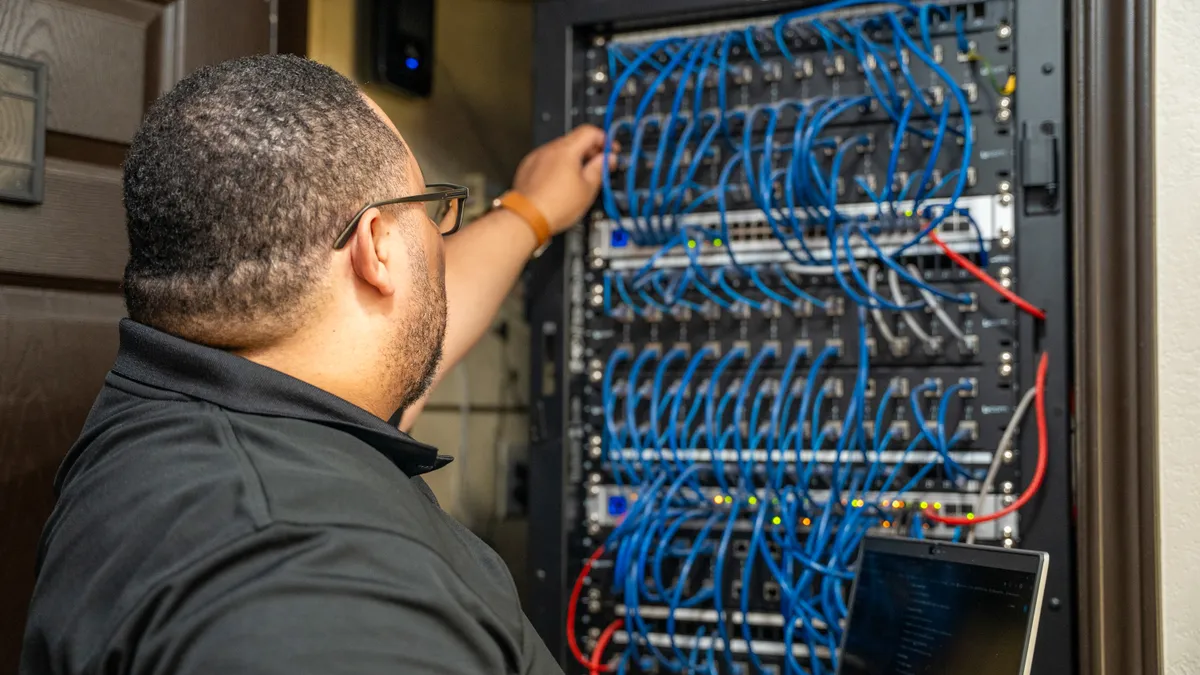 Braintek engineer in the server room