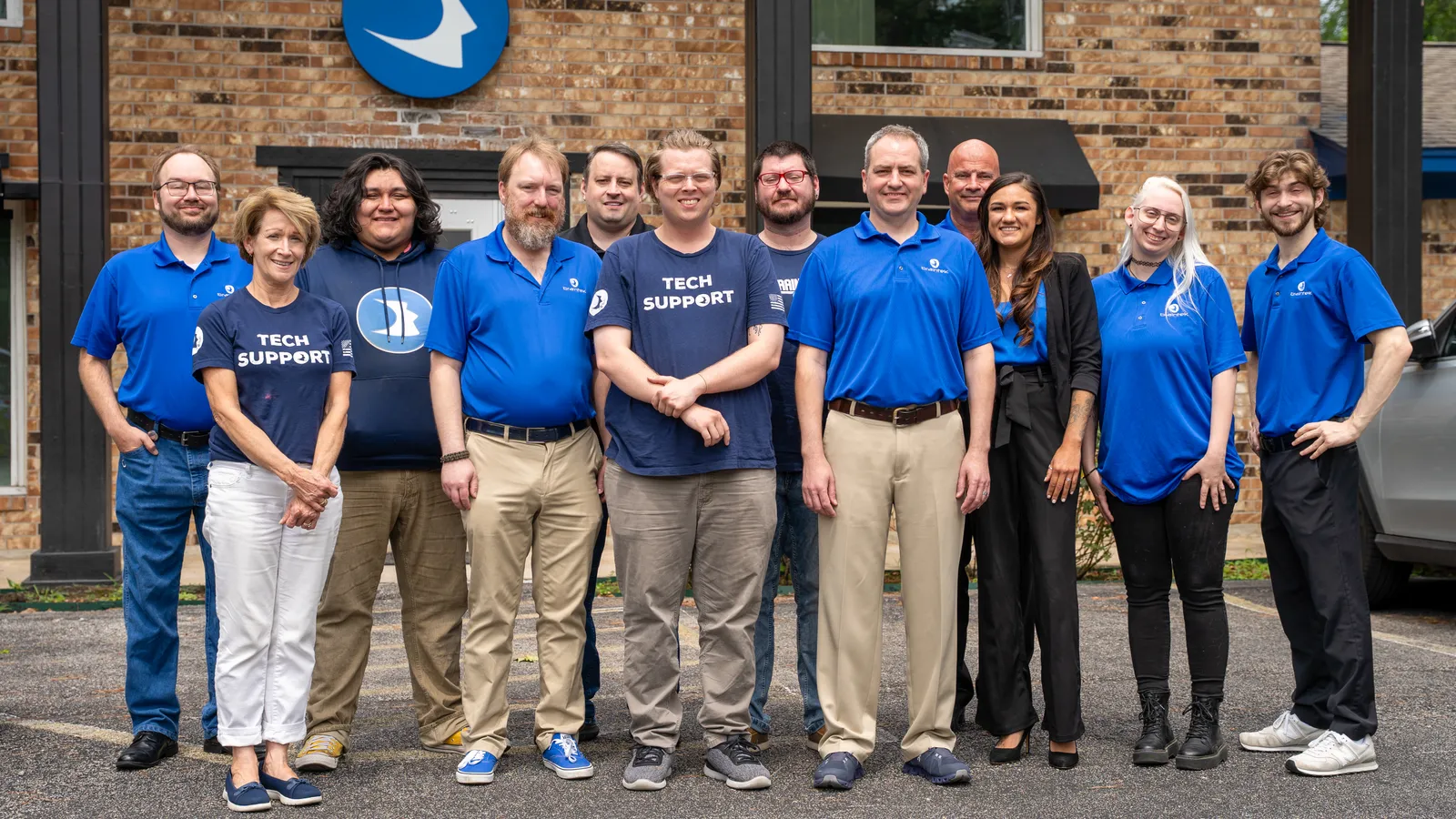 The Braintek team outside the company headquarters in Spring, Texas
